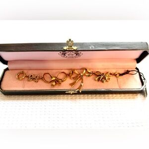 Juicy Couture Gold Toned Bow Bracelet